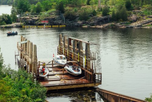 Boats being carried on the Big Chute Marine Railway on the Trent-Severn Waterway